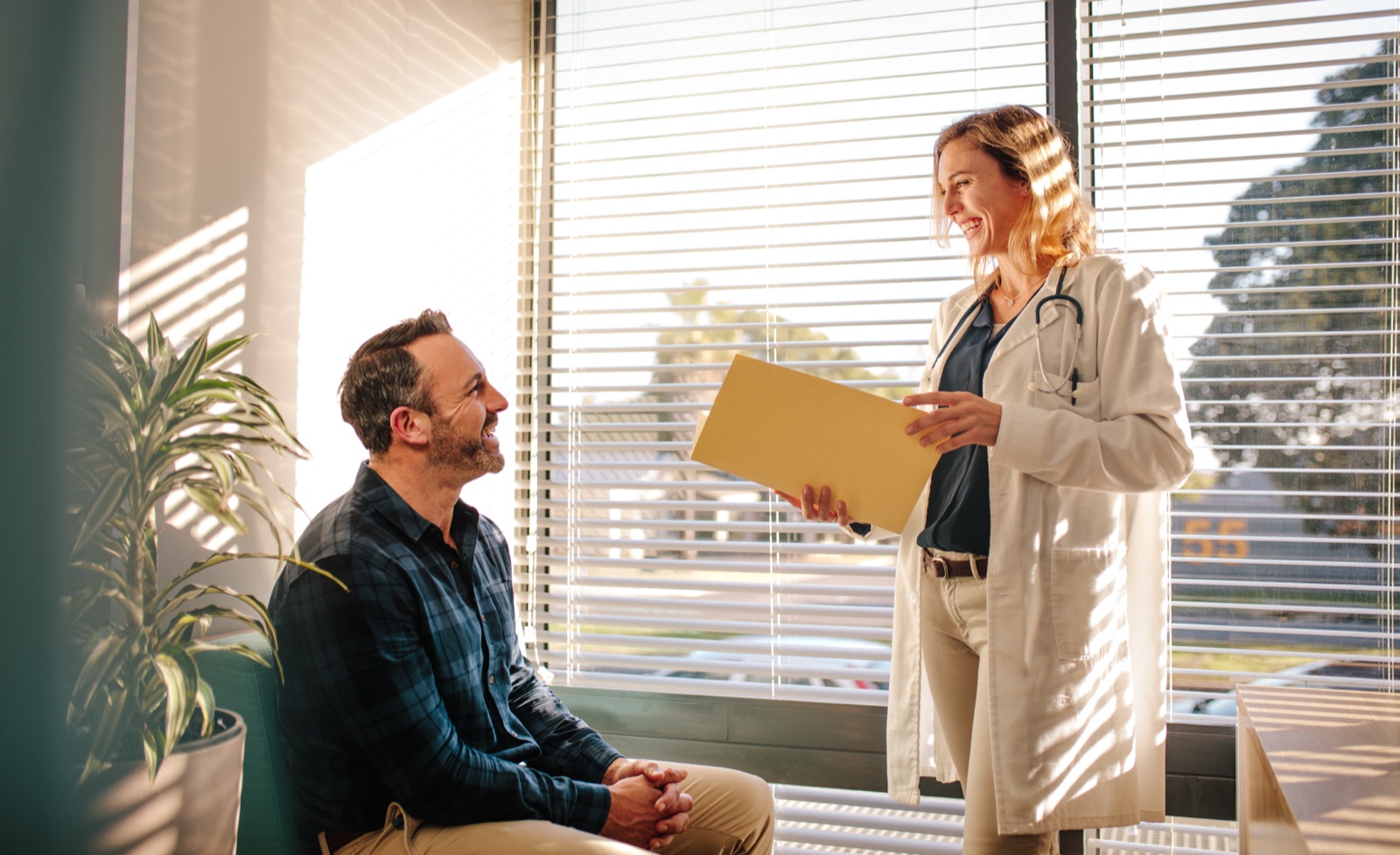 A patient speaking with a clinician during an appointment